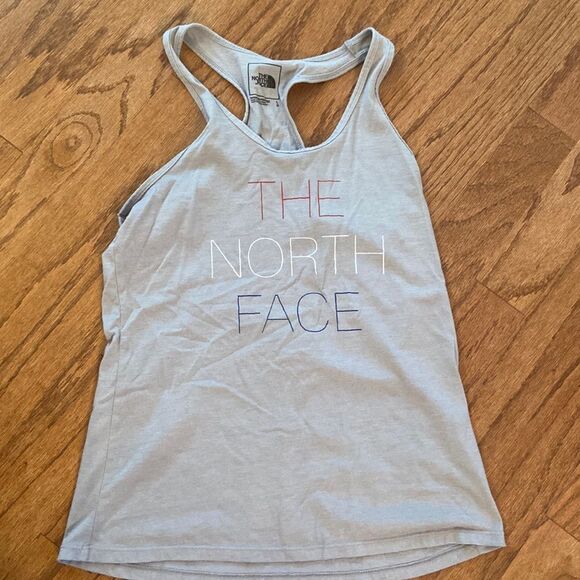 The North Face gray tank top, with red white and blue writing size large - Picture 1 of 7